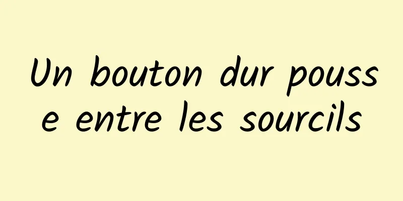 Un bouton dur pousse entre les sourcils